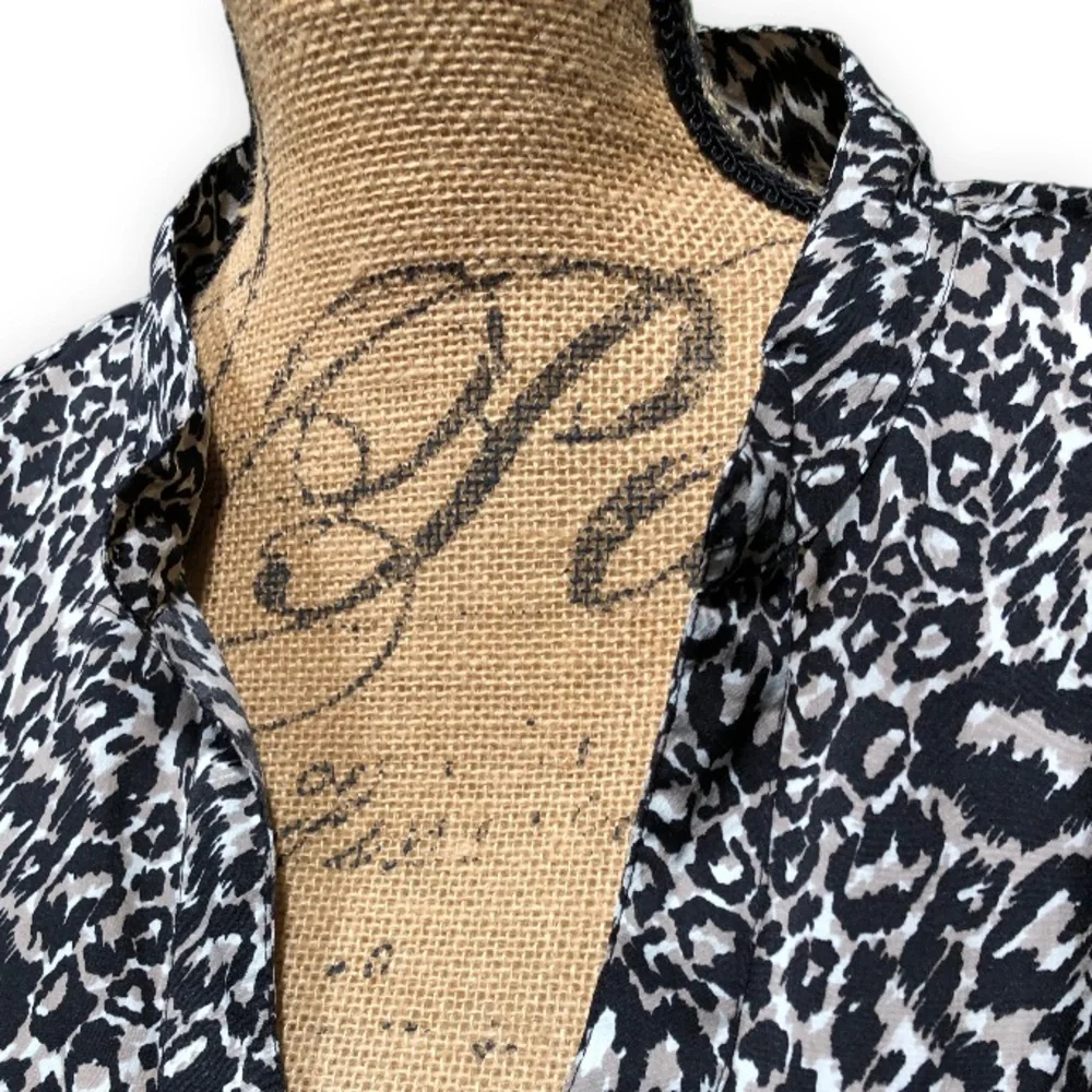 Loose Fit Leopard Print Sleeveless Front Tie Button Up Blouse from Indulge 2X - Picture 8 of 10